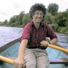 Alan Hastings rowing a boat